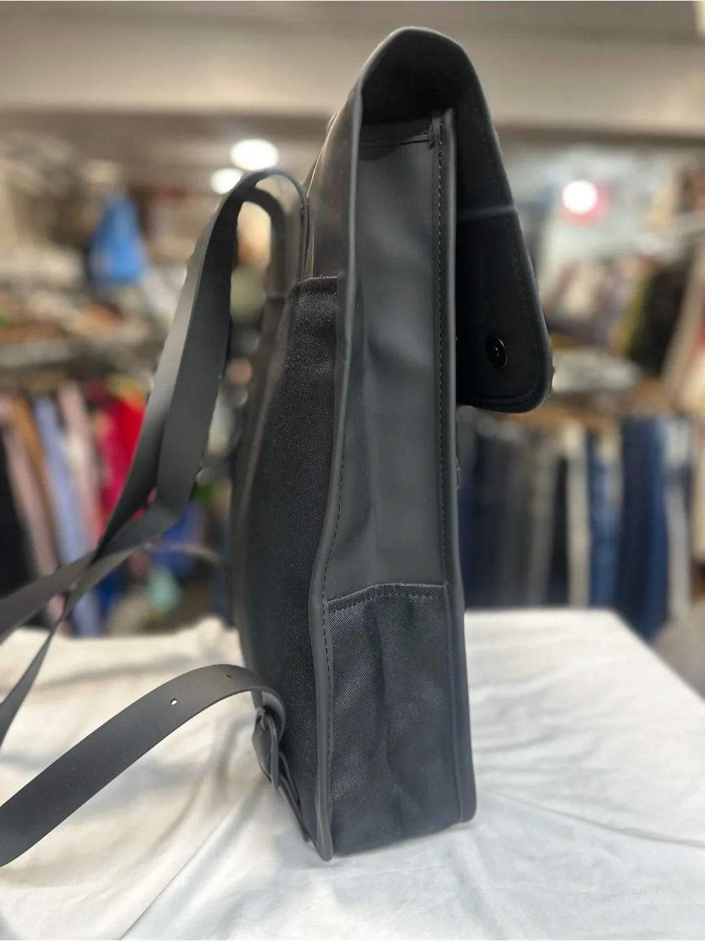 Rains  Backpack is clean and ever-contemporary. Like new no tag